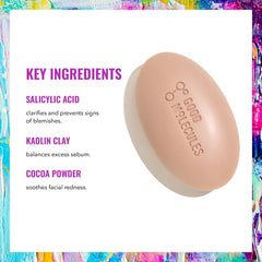 Good Molecules sliced bar revealing ingredient specks and calming botanicals