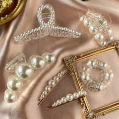 GQLV front packaging showing six pearl hair accessories and gift-ready box