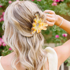 GQLV in use half-up hairstyle showing clip holding hair comfortably benefit: easy one-hand styling