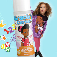 Gracie's Corner 8 oz bottle in adult hand showing travel-friendly size and convenience
