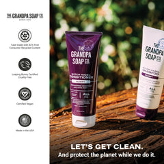 Tube of The Grandpa Soap Company conditioner next to a hand to show 8 oz scale and portable convenience benefit