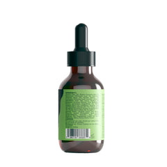 Green Cosmos dropper dispensing oil for precise application