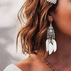 Gsoanrs earrings worn on model showing festival-ready style and bold look