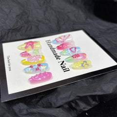 GUAACCB glossy nail surface demonstrating water-resistant finish that preserves color