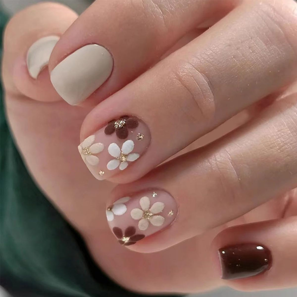 GUFUGU adhesive tabs close-up with nails being lifted to show easy, gentle removal