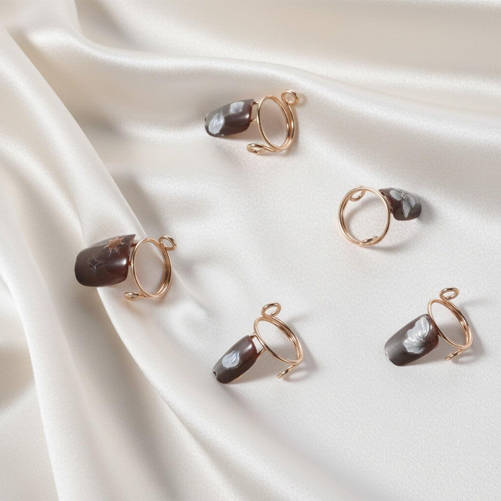 Hadnves lifestyle shot at a wedding showing elegant manicure without nail damage