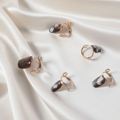 Hadnves lifestyle shot at a wedding showing elegant manicure without nail damage