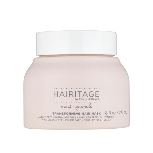 Hairitage front jar showing product branding and restorative benefits