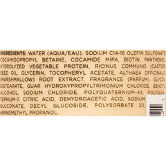 Hairitage bottle next to recyclable symbol and vegan badge highlighting ethical claims
