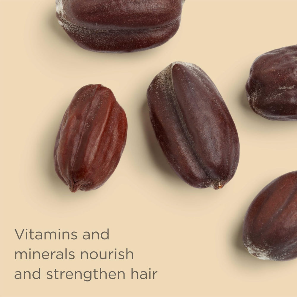 Hairitage jojoba oil droplet close-up showing moisturizing benefit