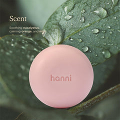 HANNI bottle packed with travel gear for on-the-go hydration