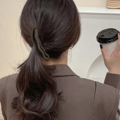 Hapdoo half-up hairstyle example showing easy styling benefit