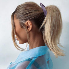 Hapdoo on model in half-up style for polished look benefit