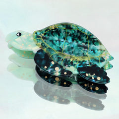 Hapdoo sea turtle lifestyle on beach towel showing ocean-themed styling benefit