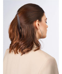 Hapdoo matte surface close-up emphasizing smooth finish that protects hair