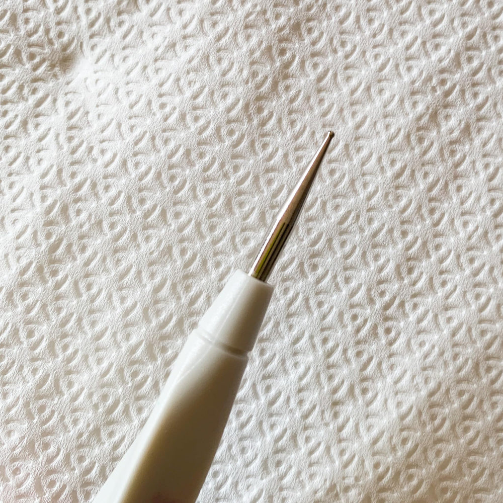Happy Dotting Company handle with stamped sizes visible for quick tip identification