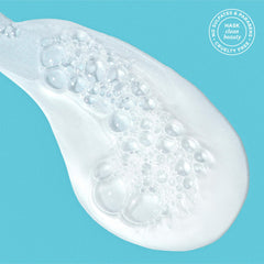 HASK shampoo being dispensed showing easy application benefit