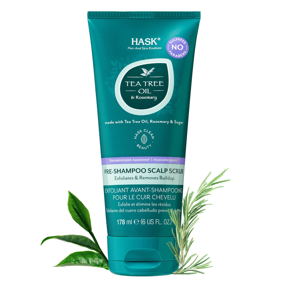 HASK bottle held by hand for scale showing pack size and portable pre-shampoo use