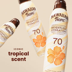 Hawaiian Tropic clear mist on arm demonstrating lightweight finish