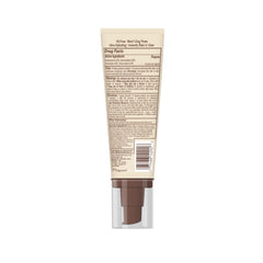 Hawaiian Tropic tube beside sunglasses showing compact, portable size