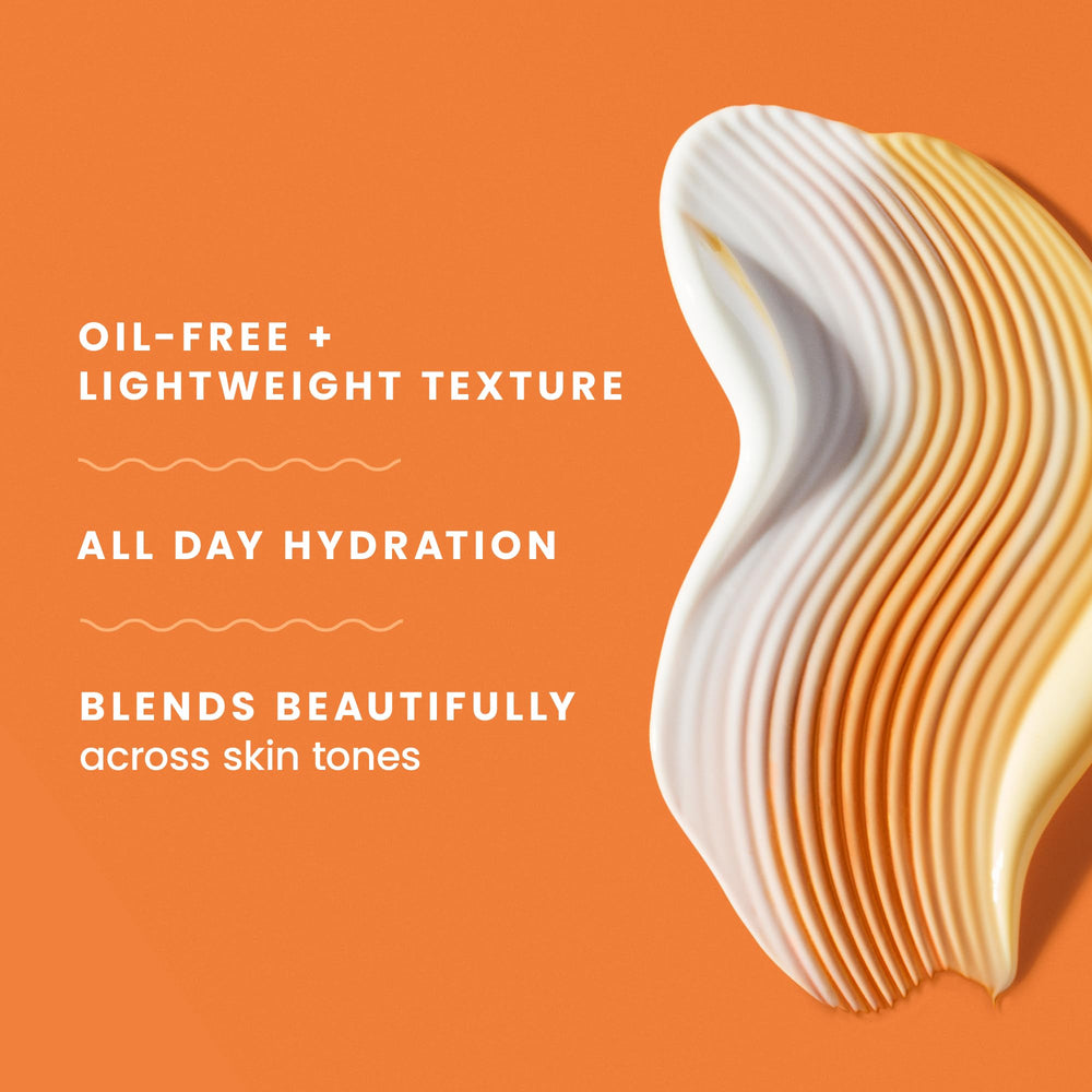 Hawaiian Tropic travel bottle held in hand for convenient portability