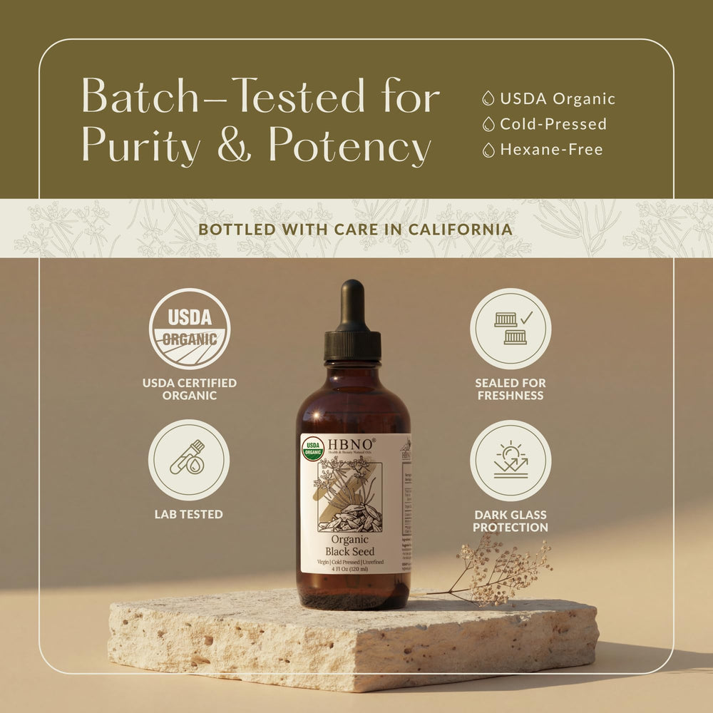 HBNO used as face serum on fingertips demonstrating lightweight skin nourishment