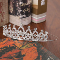Hedume girl wearing a crystal crown, boosting birthday charm