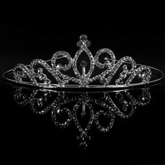 Hedume woman wearing a tiara at a wedding, enhancing her look