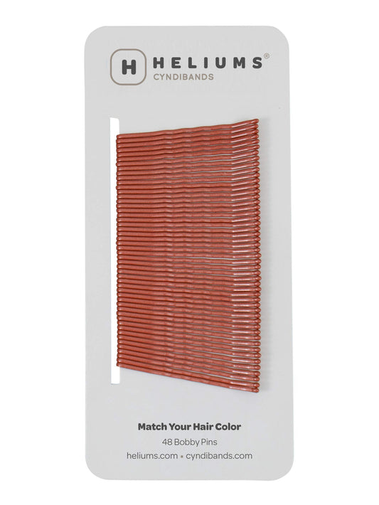 Heliums pack front showing auburn pins and clear benefit of color matching