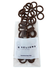 Heliums front packaging showing 40-count dark brown elastics and benefits