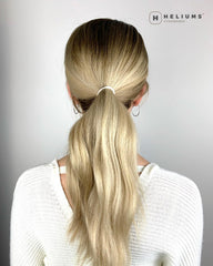 Heliums used in a child's neat hairstyle showing gentle, snag-free hold