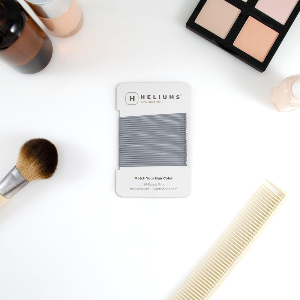 Heliums pins on vanity demonstrating everyday styling convenience