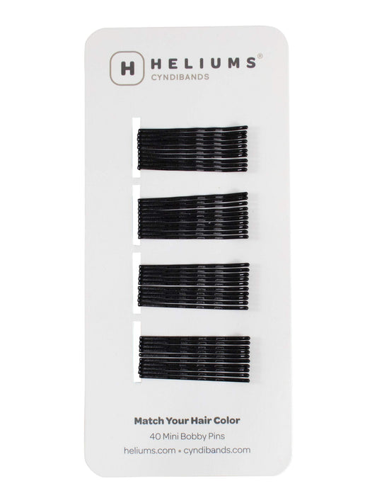 Heliums mini bobby pins front pack showing compact black pins and convenience