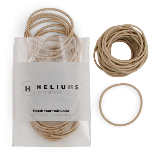 Heliums front pack showing 40 sandy blonde elastics, convenient storage