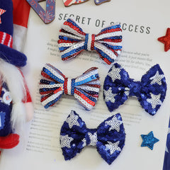 HELYKAKA four bows arranged flatlay showing color coordination and set variety