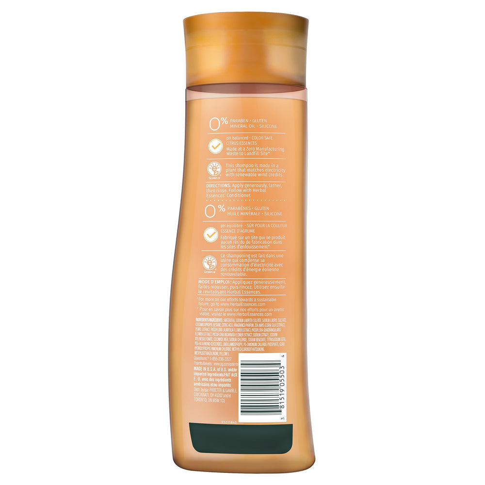 Herbal Essences pump close-up highlighting pour action for controlled, no-waste application