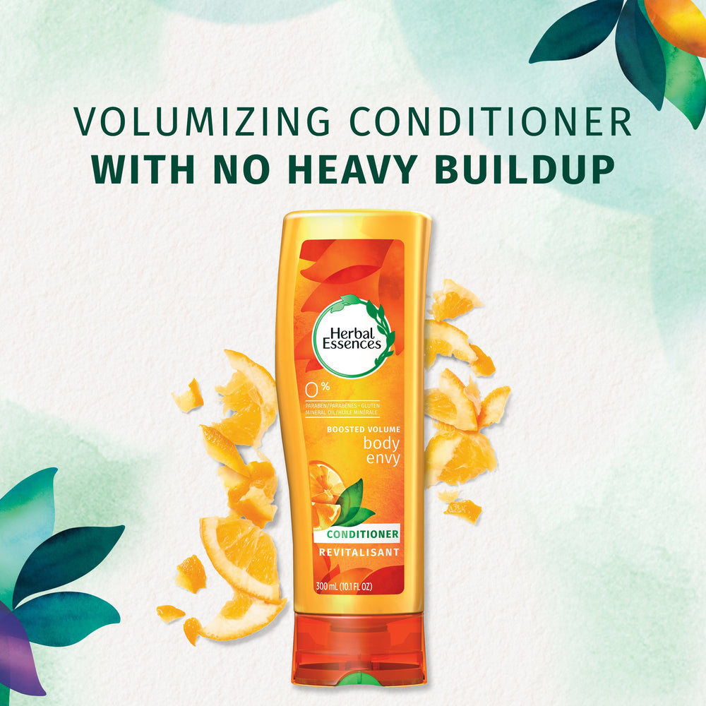 Herbal Essences conditioner dispensed showing lightweight creamy texture
