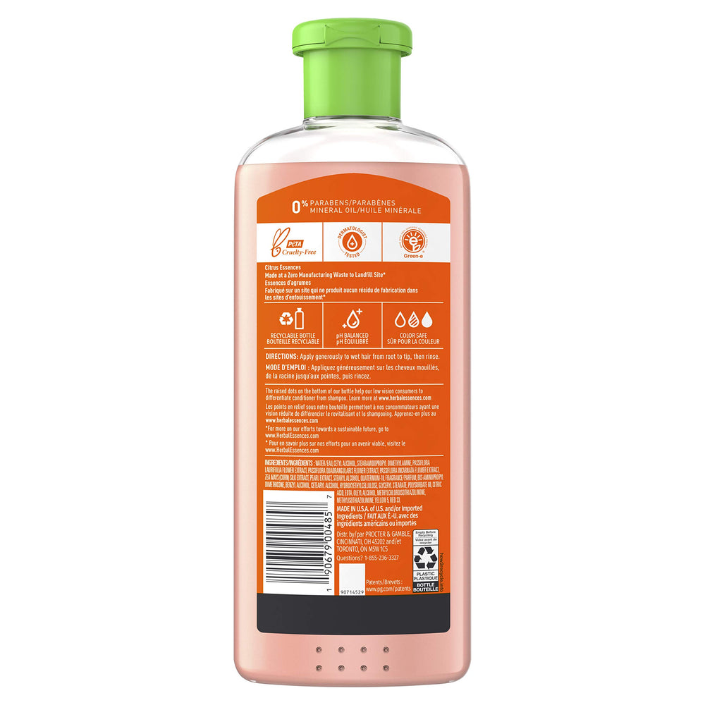 Herbal Essences conditioner texture close-up demonstrating lightweight spread