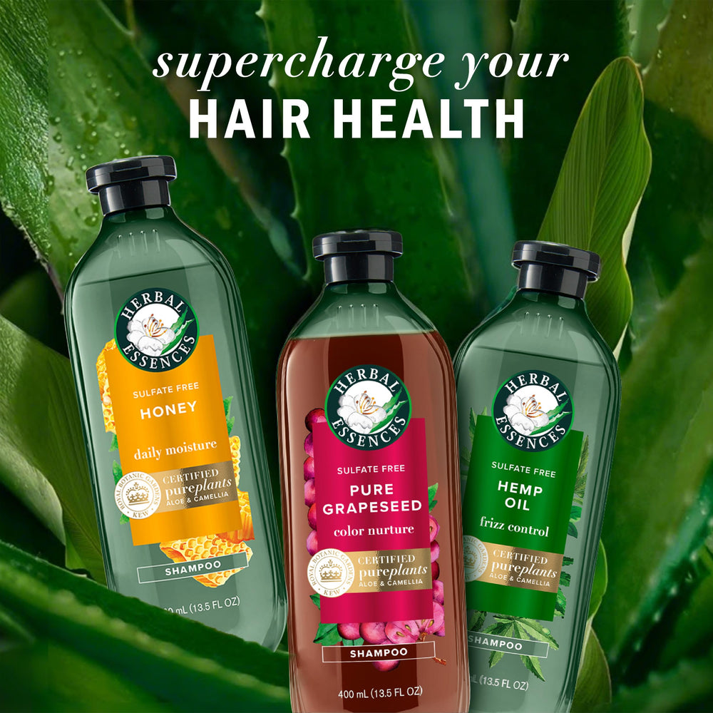 Close-up of Herbal Essences bottle raised dots and product information