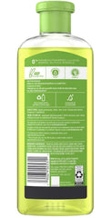 Herbal Essences creamy lather on fingers demonstrating lightweight cleanse and easy rinse