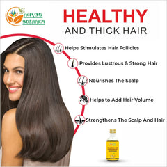 Applying Herbs Botanica oil to hair ends to hydrate and reduce frizz benefit
