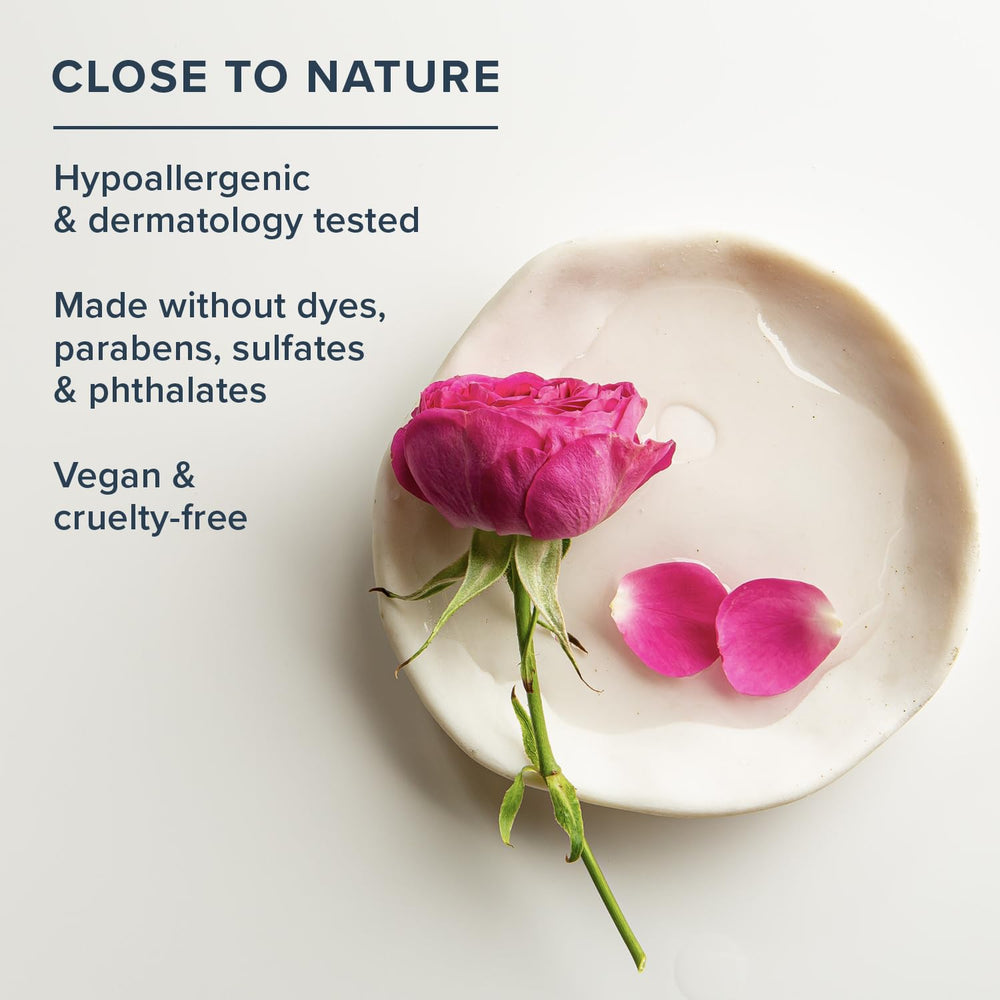 HERITAGE STORE rose and olive squalane ingredients beside bottle highlighting botanical soothing and moisturizing benefits