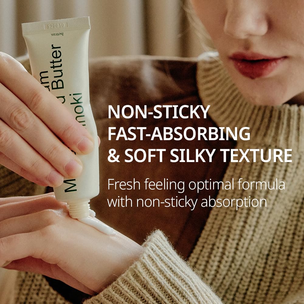 hetras applying cream to wrist demonstrating fragrance layering benefit