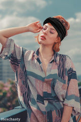 Hexchasty worn during yoga demonstrating sweat-resistant, stay-put benefit