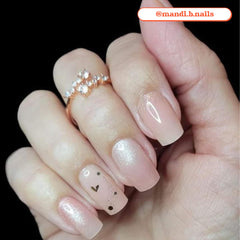 heyhae applying a strip to a nail demonstrating quick easy application for busy users