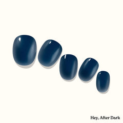 heyhae lifestyle shot of navy manicure at Halloween night conveying festive, bold style