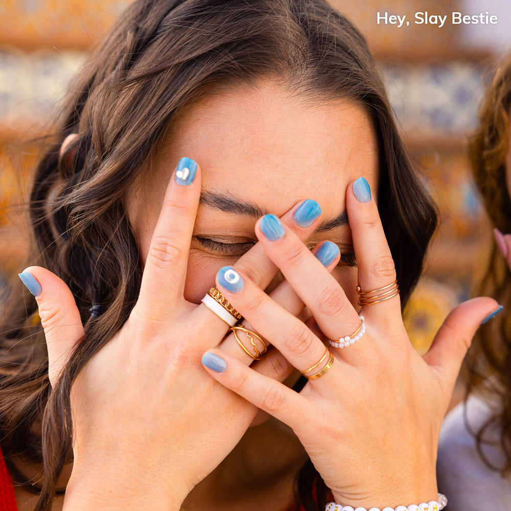 heyhae single nail on finger showing polished blue finish and salon look