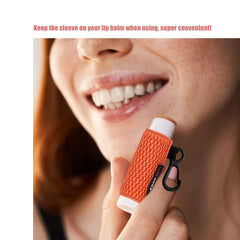 HEYSKAY sleeve clipped to backpack zipper offering hands-free lip care