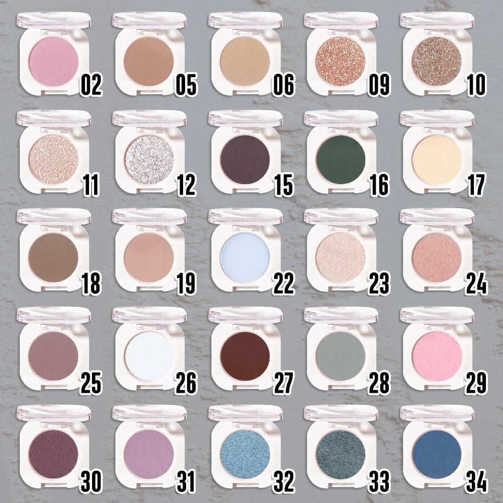 HHLTOH brush loaded with teal shadow demonstrating buildable application benefit