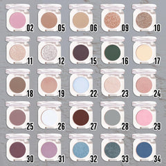 HHLTOH brush loaded with teal shadow demonstrating buildable application benefit